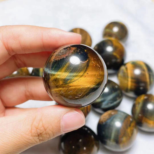 Yellow and blue tiger eye spheres crystal sphere