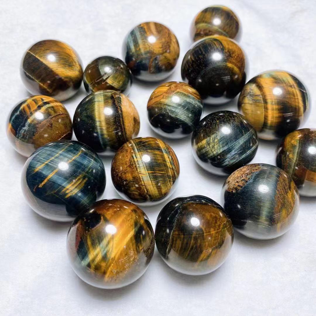 Yellow and blue tiger eye spheres crystal sphere