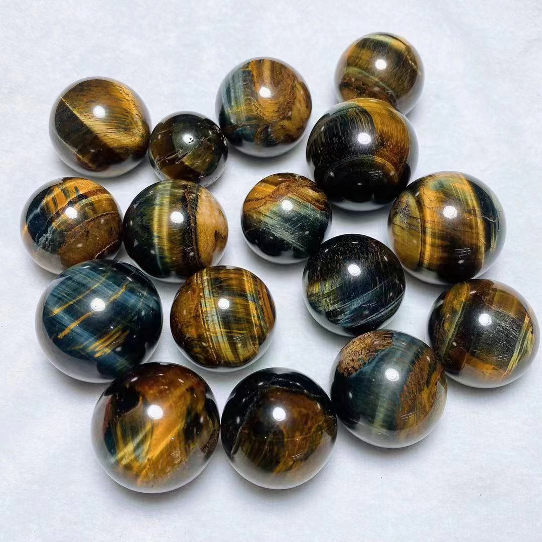 Yellow and blue tiger eye spheres crystal sphere